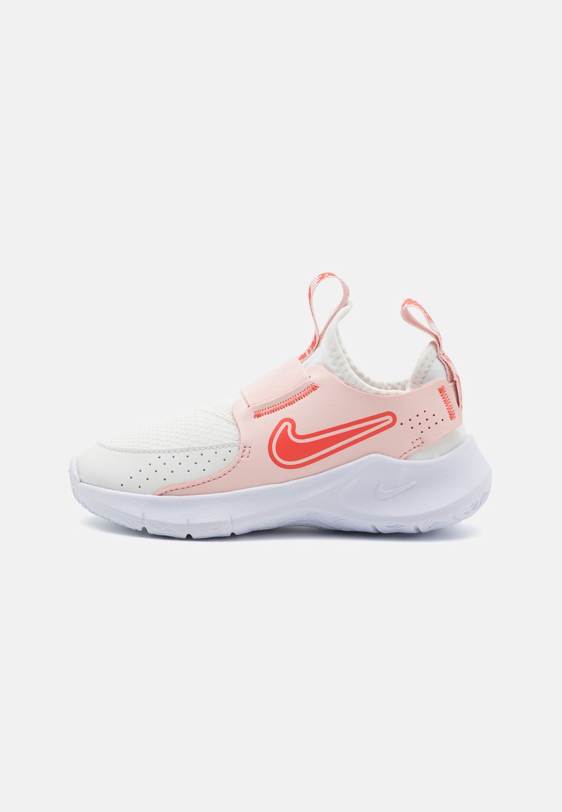 Nike athletic shoe with a white mesh upper, pink synthetic accents, and a white rubber sole. Features a slip-on design and rear pull tabs.
