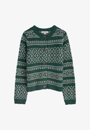 Cardigan en tricot vert avec des motifs géométriques blancs, col rond et cinq boutons marron à l'avant.
