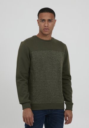 Olive green sweatshirt with a textured upper panel and fine contrasting lines. Ribbed neck and cuffs, long sleeves, simple design.