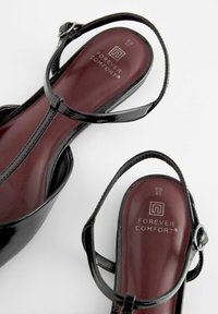 Next FOREVER COMFORT - Baletkurpes ar atvērtu aizmuguri - black