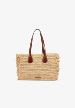 Borsa rettangolare in paglia intrecciata con manici in pelle marrone e lati frangiati, con una piccola etichetta frontale.