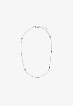 Naszyjnik z koralików, składający się z przezroczystych i metalicznych owalnych koralików, z rozszerzanym łańcuszkiem w odcieniu srebra umożliwiającym regulację długości.