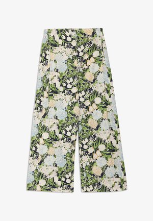 Pantalon à jambes larges avec un motif floral multicolore comprenant des feuilles vertes, des tulipes blanches, ainsi que des fleurs bleu pastel et pêche sur un fond sombre.