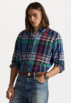 Katoenen geblokt overhemd met veelkleurige vierkanten in blauw, groen, rood en geel, met een button-down kraag en opgerolde mouwen.