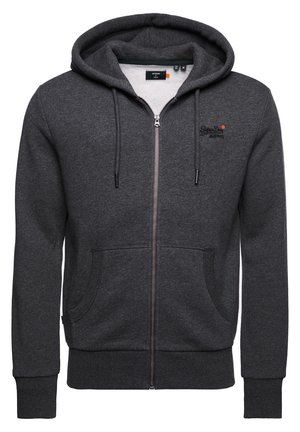 Dunkelgrauer Kapuzenpullover mit Reißverschluss, Kordelzügen, Fronttaschen und kleinem gesticktem Logo auf der linken Brust.