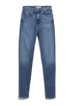 Slim fit jeans in mediumblauwe denim. Voorzien van traditionele vijf-pocket styling, riemlussen en een licht vervaagde oppervlak voor textuur.