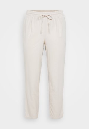 Lyse beige, løstsiddende bukser med elastisk talje og snøre. Har sidelommer og lige ben design. Blød tekstur.