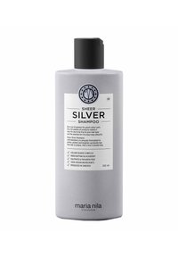 Bottiglia di shampoo in plastica grigia con coperchio a flip-top nero. L'etichetta frontale presenta un pannello bianco con del testo e un logo circolare. Dimensione: 350 ml.