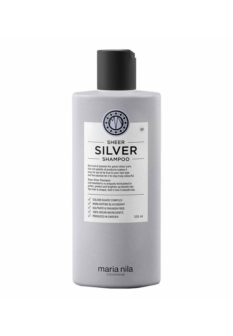 Bottiglia di shampoo in plastica grigia con coperchio a flip-top nero. L'etichetta frontale presenta un pannello bianco con del testo e un logo circolare. Dimensione: 350 ml.