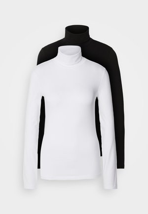 Two long-sleeve turtleneck tops, one white and one black, made of a smooth, stretchy fabric, both featuring slim-fitting design and high collars.