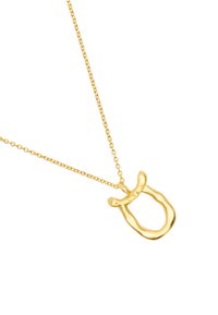 Złoty naszyjnik z teksturowanym, abstrakcyjnym wisiorkiem w kształcie dużej litery 'U'. Posiada cienki, delikatny łańcuszek.