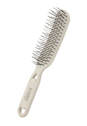 Cepillo de pelo beige con púas metálicas rematadas con pequeños extremos redondeados y un mango ergonómico etiquetado como "IDealion."