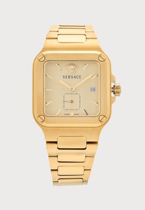 Montre-bracelet Versace en or avec cadran carré, affichage de la date, logo Méduse et bracelet métallique à maillons.