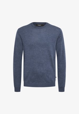 Zils piegriezuma džemperis ar apaļu kaklu, izgatavots no mīksta adīta auduma, ar garām piedurknēm un ribotu apakšmalu. Tekstūrēta apdare ar vieglu krāsu variāciju.