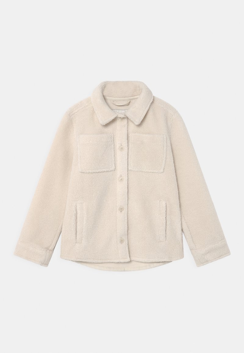 Beige fleece jacket with a collared neck, two front patch pockets, and button closure. Soft texture and long sleeves.