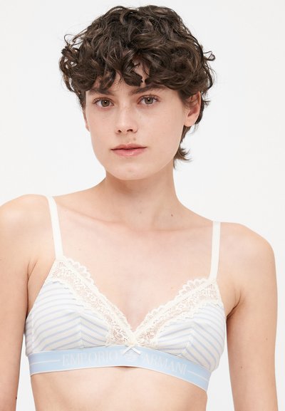 Light blue and white striped bralette with lace trim, creamy underband featuring "Emporio Armani" logo, adjustable straps, soft texture.