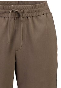 Braune Hose mit elastischem Bund und Kordelzug, mit glatter Textur und minimalistischem Design, geeignet für Freizeitkleidung.