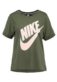 Olivgrön bomull t-shirt med korta ärmar, med en stor rosa Nike-logga tryckt på framsidan. Rund halsringning och avslappnad passform.