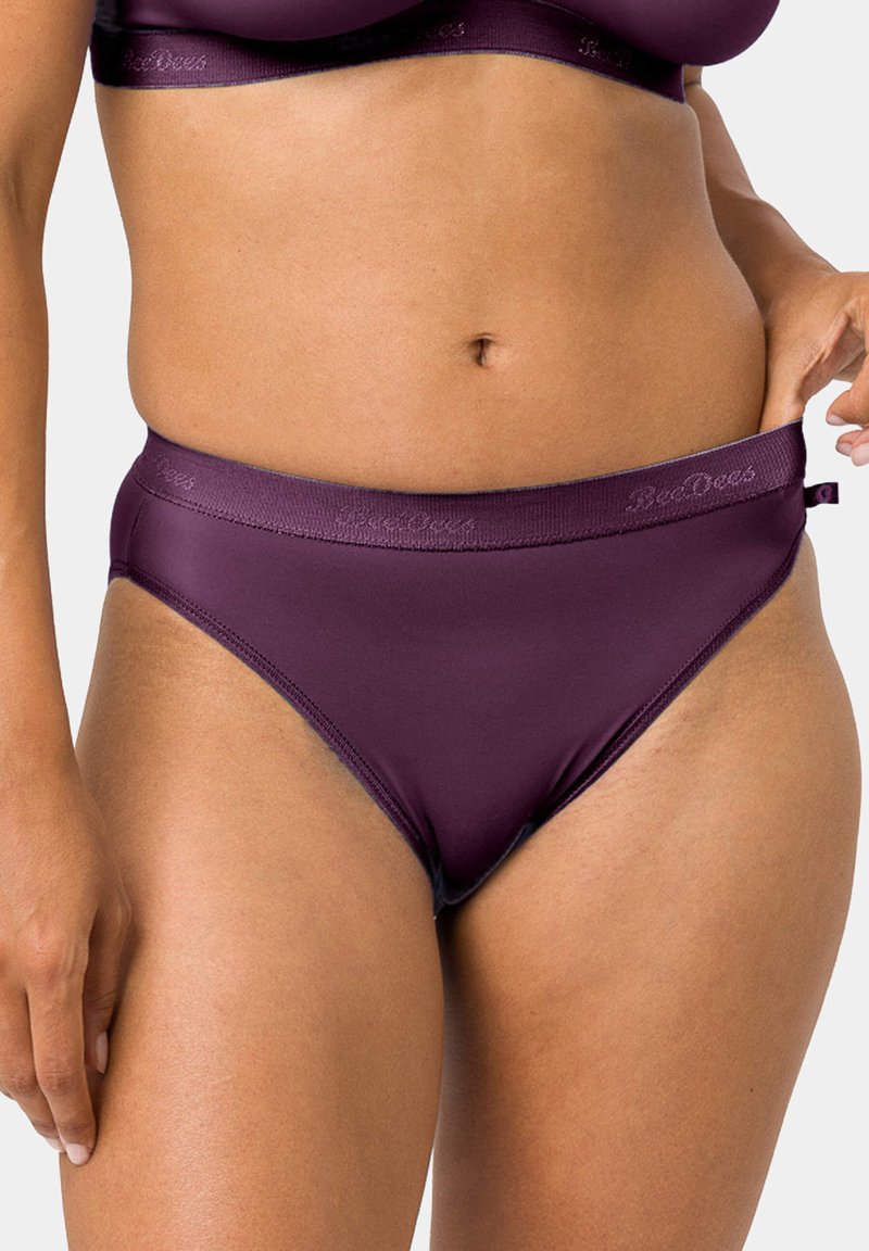 Dark purple high-waisted panty with a smooth texture and elastic waistband. Features tonal branding on the waistband. Suitable for everyday wear.