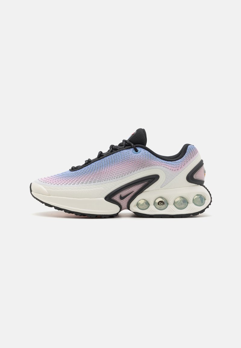 Sport sneaker with a white mesh upper, gradient blue and pink tones, black laces, and bubble heel cushioning. Textured sole for grip.