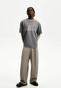 Bershka - Trousers - sand Thumbnail Image 1