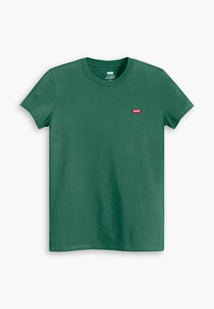 Grøn bomulds t-shirt med rund hals, korte ærmer og et rødt Levi's logo patch på venstre bryst. Glat tekstur, standard pasform.