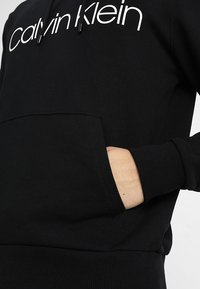 Calvin Klein LOGO HOODIE - Sweatshirt - perfect black