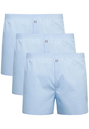 Costumi da bagno azzurri chiari in cotone leggero, dotati di una vita elastica, senza tasche e dal design semplice, venduti in confezione da tre.