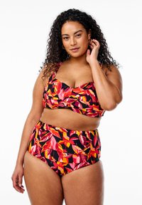 Black bikini with vibrant floral patterns in red, pink, and yellow. The top has a ruched design, while the high-waisted bottom features similar patterns.