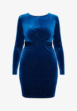 Samtiges, langärmeliges Kleid in sattem Blau, mit einer verdrehten Oberteil-Details und verstreuten Funkeln. Figurbetonte Silhouette.