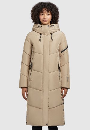 Beige, knielanger Daunenmantel mit Kapuze, mit Reißverschlusstaschen und einem knöpfbaren Seitenöffnung. Besitzt ein gestepptes Muster und einen Kordelzugverschluss.