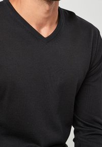 Next Sweter