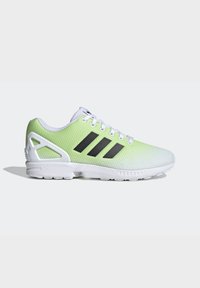 Adidas sneakers feature a gradient mesh upper in light green and white, black stripes, and a white rubber sole with a unique heel shape.