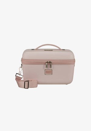 Hartschalen- kosmetikcase in hellem Pink mit horizontaler Rillstruktur, doppeltem Reißverschluss, metallischen Akzenten und abnehmbarem Schultergurt.
