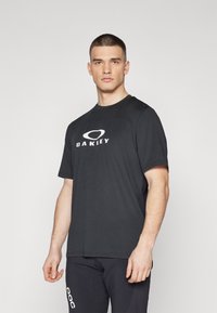 Oakley - FACTORY PILOT  - Sport T-Shirt - blackout Thumbnail-Bild 1