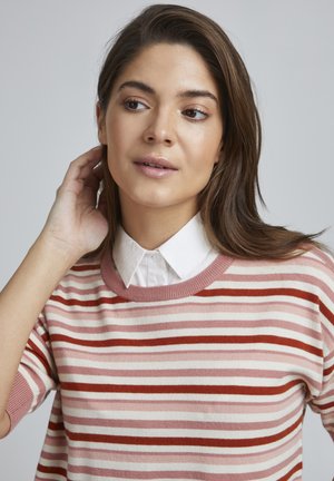 Striped knit sweater with pink, white, and red colors, featuring short sleeves and a crew neckline over a white collared shirt.