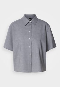 Gray short-sleeve shirt made of lightweight fabric, featuring a collar, button-down front, a single chest pocket, and a relaxed fit.