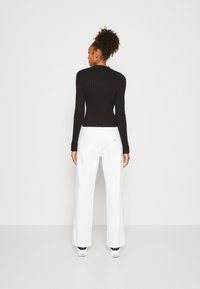 Tommy Jeans SWEATER - Jersey de punto - black