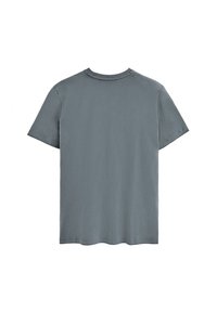 Grå kortärmad t-shirt, i bomullsmaterial, rundad halsringning, enkel design utan mönster, något krökt fåll.