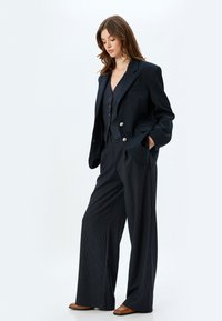Koton PALAZZO - Tygbyxor - dark blue
