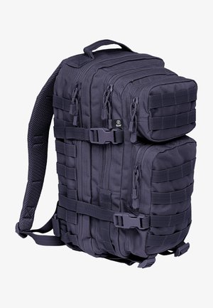 Zaino tattico nero compatto con molteplici scomparti con zip, cinghie di compressione, spallacci imbottiti e sistema MOLLE per attacchi.