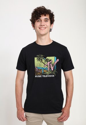 Black cotton t-shirt featuring a colorful MTV graphic with palm trees and beach chairs, text reading "MUSIC TELEVISION" in white.
