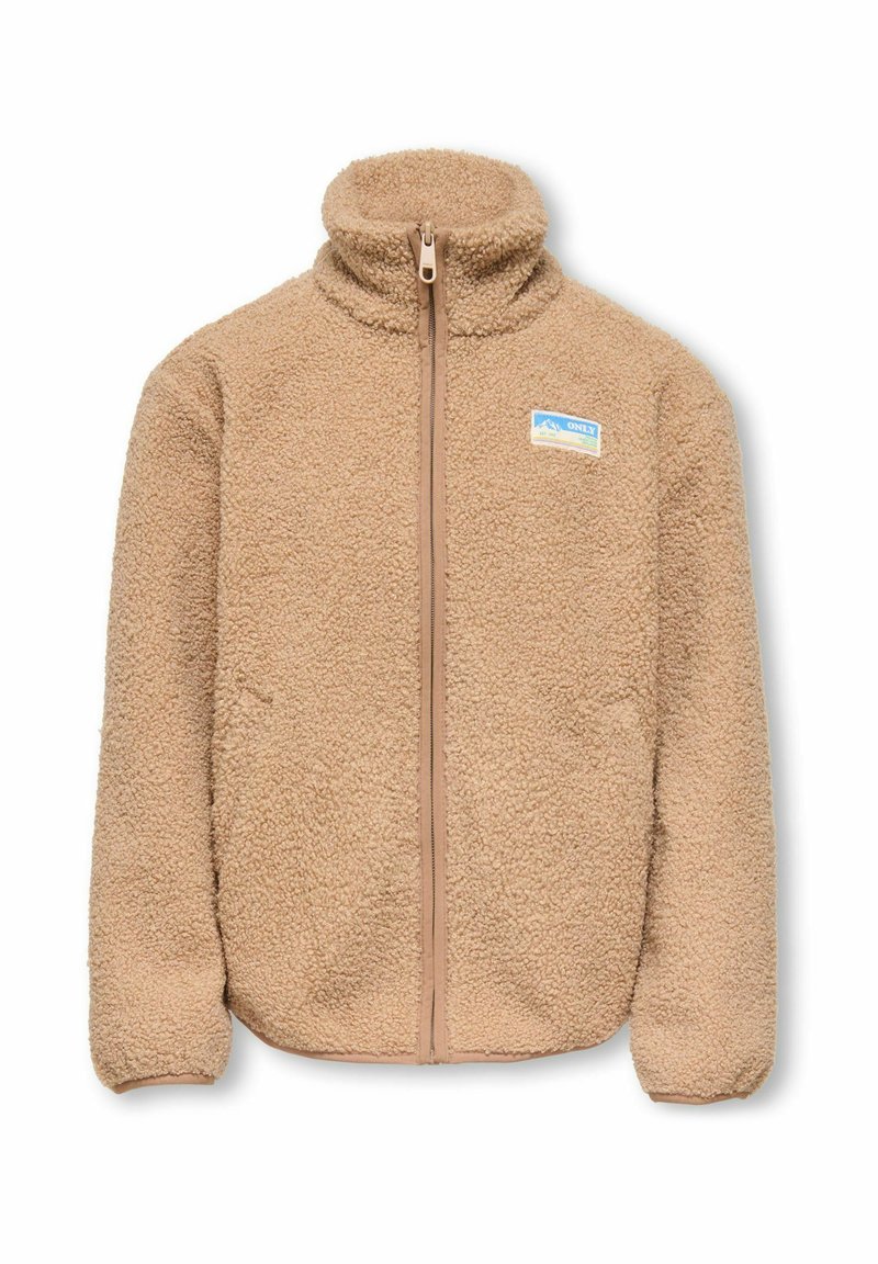 Beige fleecejakke med høy krage og glidelås. Har en liten blå og gul logo på venstre bryst. Myk tekstur.