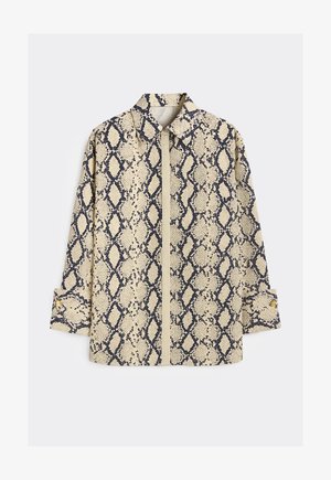 Langærmet beige skjorte med sort slangeprint, knapmanchetter, spids krave og skjult knaplukning foran.