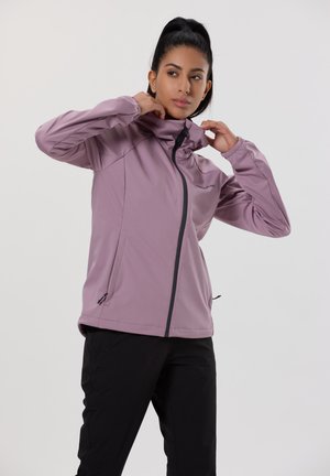 Veste zippée lilas avec col montant, fermeture éclair noire, deux poches latérales et manches élastiques. Matière lisse et résistante à l'eau.