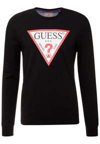 Zwarte sweatshirt met een driehoekig logo in rood en wit, bedrukt met tekst, lange mouwen en een ronde hals.