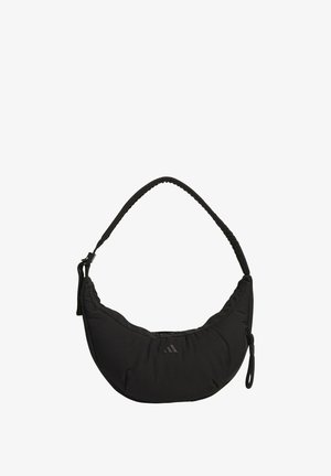 Black shoulder bag with a curved design, padded fabric, adjustable strap, and subtle logo. Features a zippered compartment and textured accents.
