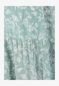 Seleccionado, vert indien