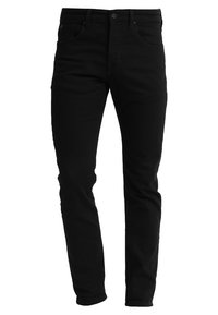 Jeans de mezclilla negra con un ajuste slim, que cuentan con cinco bolsillos, trabillas para cinturón y un cierre de botón clásico. Textura suave y costuras mínimas.