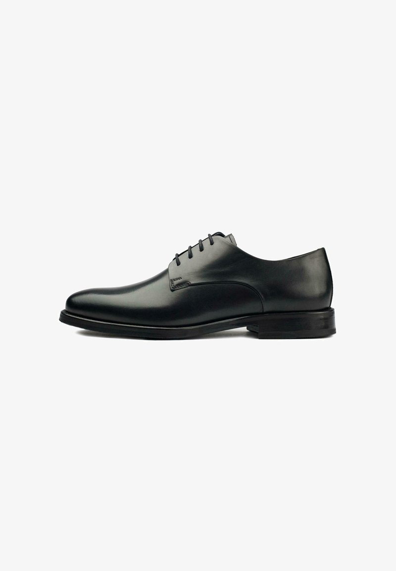 Black leather dress shoe with a smooth finish, rounded toe, five eyelet lace-up design, and a low stacked heel.